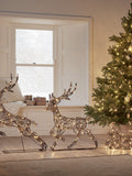 Lights4fun rattan reindeer sleigh with LEDs (British brand)