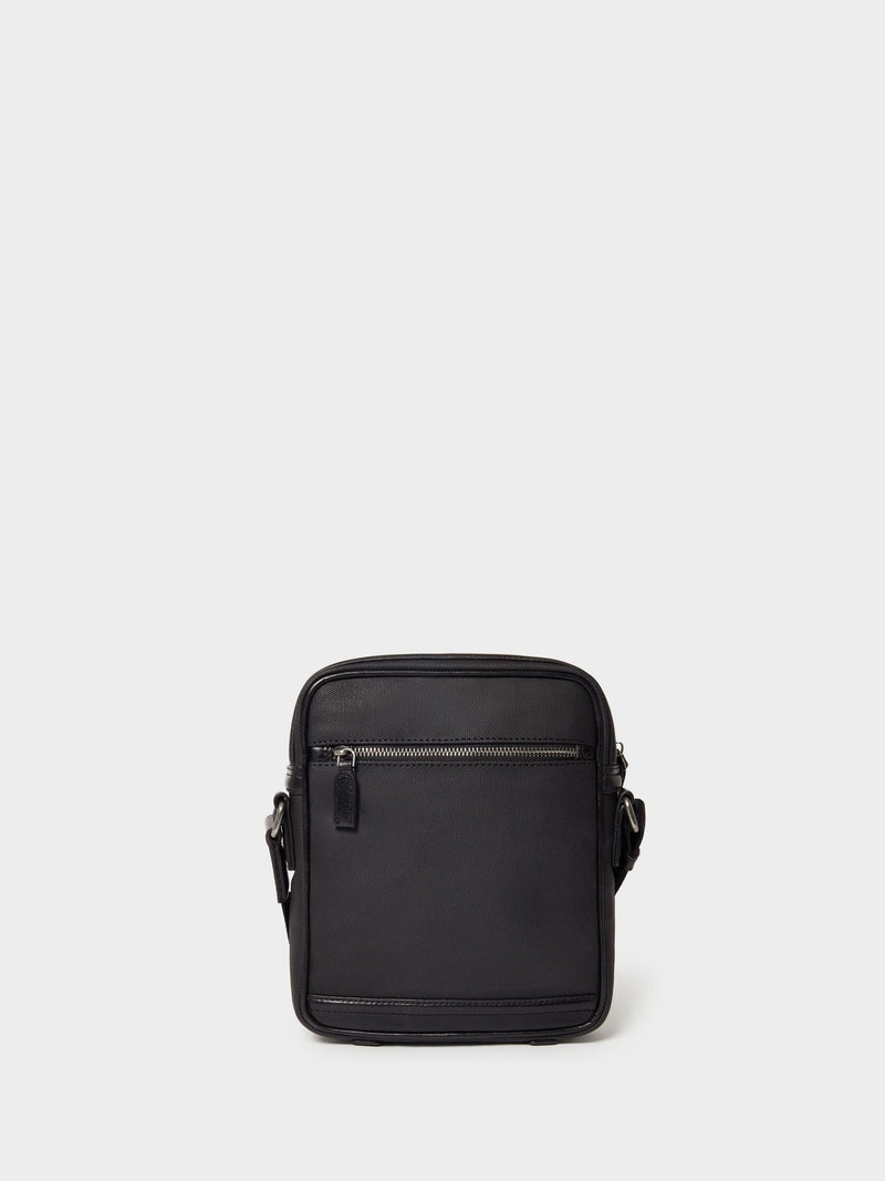 Osprey London Frontline black waxed canvas and leather messenger bag, imported from the UK