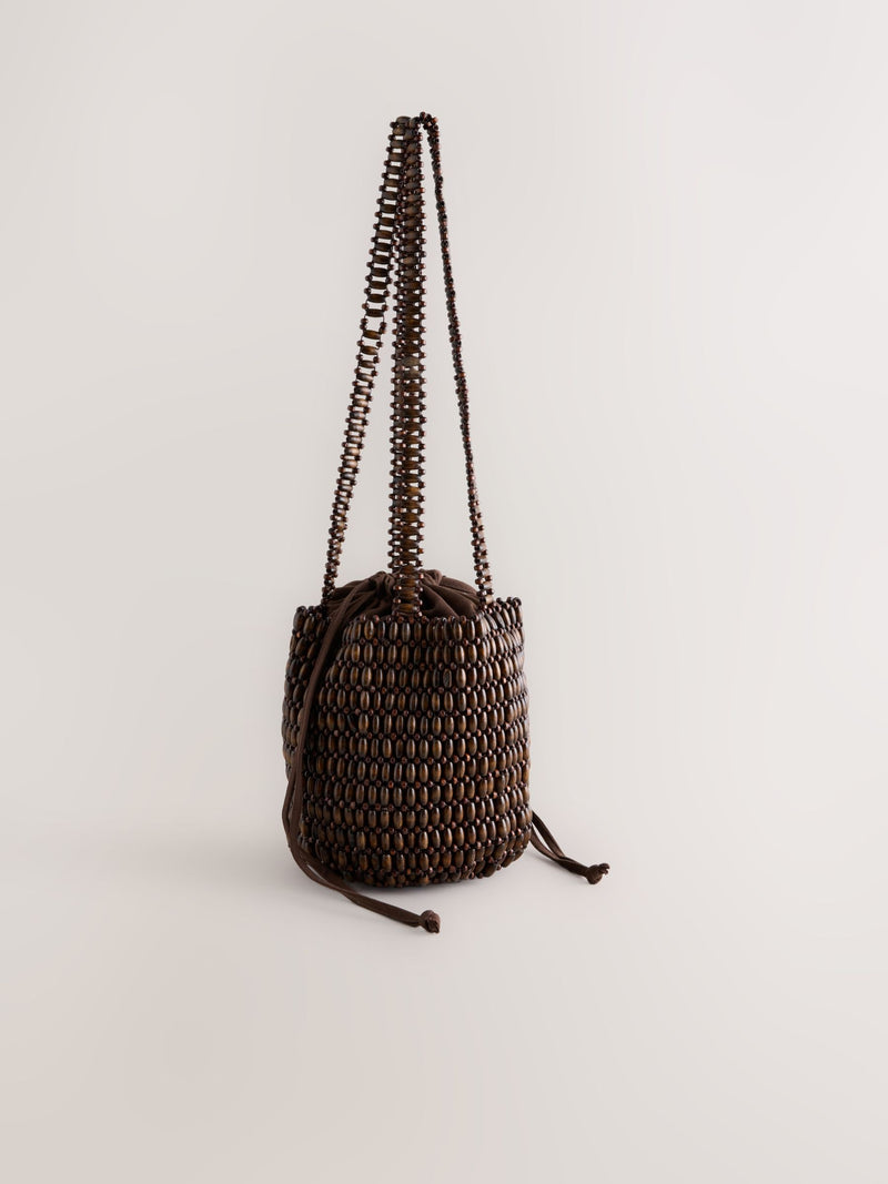Wooden beaded shoulder bag in chocolate brown, imported from the UK