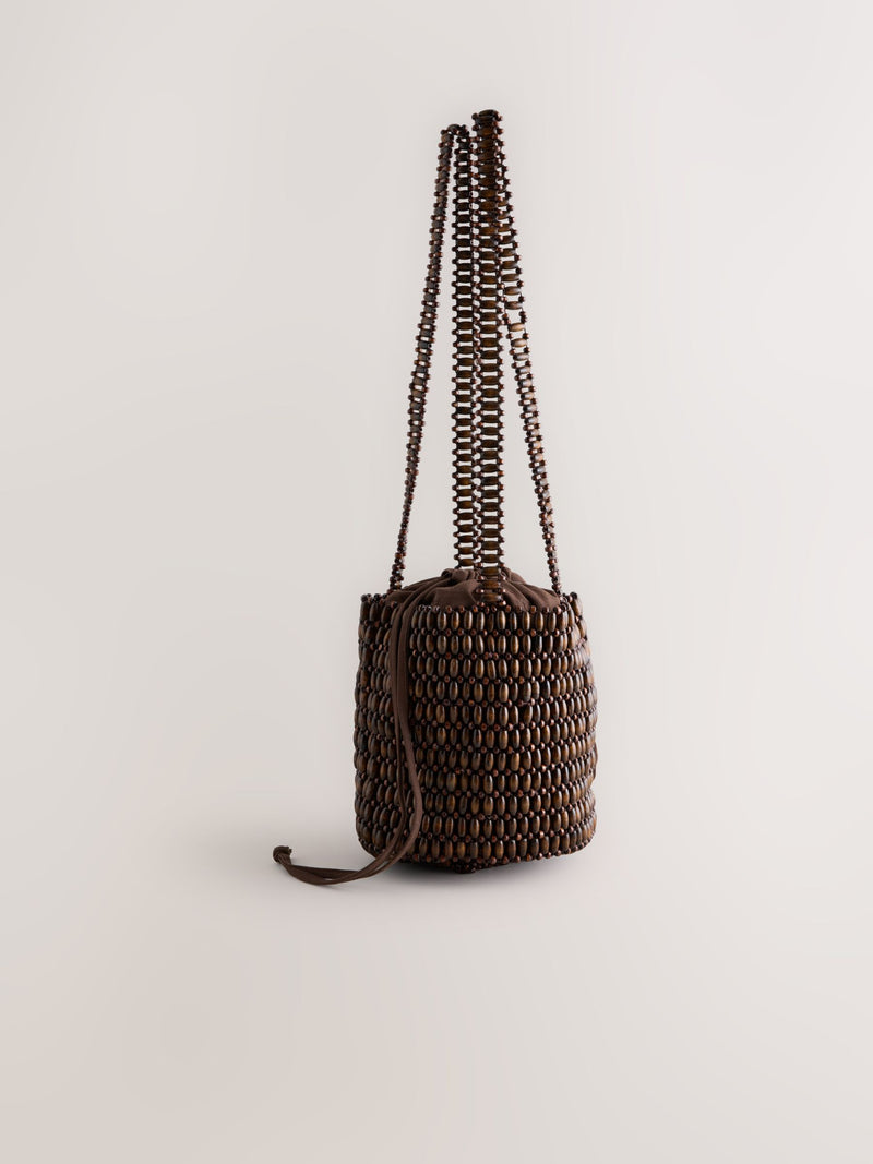 Wooden beaded shoulder bag in chocolate brown, imported from the UK