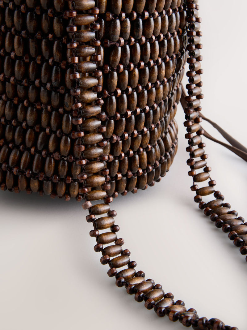 Wooden beaded shoulder bag in chocolate brown, imported from the UK
