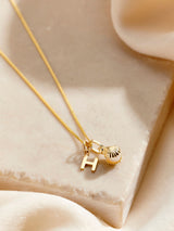 Next Posh Totty Designs 9ct Gold Initial and Pearl & Shell Charm Pendant- Buy online at McGrocer