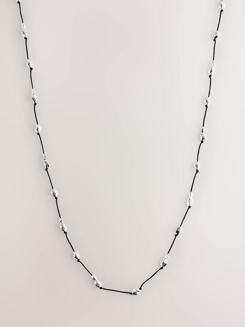 Silver tone beaded cord long necklace (British brand)