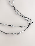 Silver tone beaded cord long necklace (British brand)