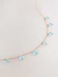 Gold tone gemstone drop necklace with turquoise beads - British product