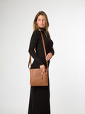 Pure Luxuries London black leather cross-body bag, imported from the UK