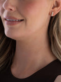 Beaverbrooks gold stud earrings cubic zirconia swirl, imported from the UK