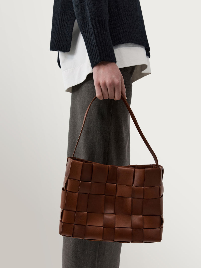 St Agni brown woven leather mini tote bag, UK version