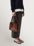 St Agni brown woven leather mini tote bag, UK version
