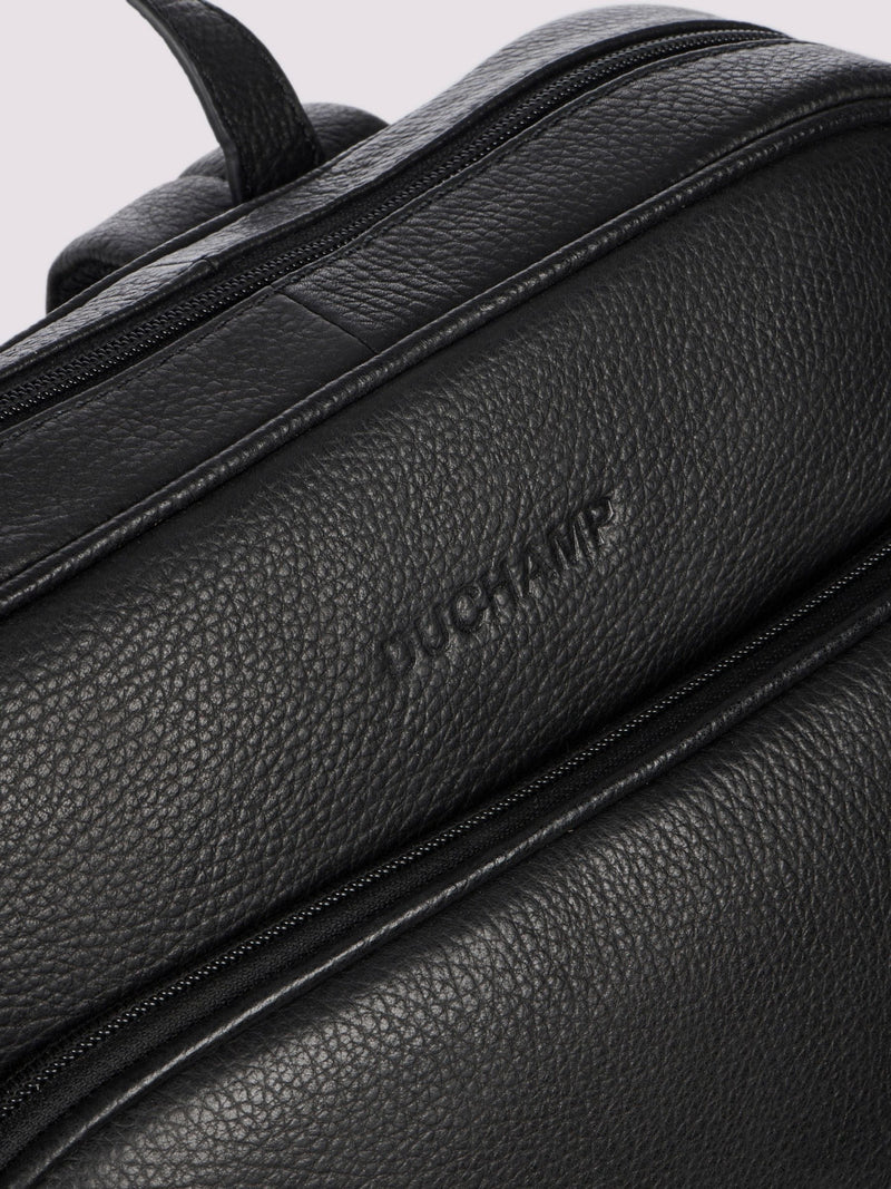 Duchamp black leather backpack with laptop sleeve, imported from the UK