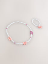 Next Pink Pearl Bow Jewellery Set- Buy online at McGrocer