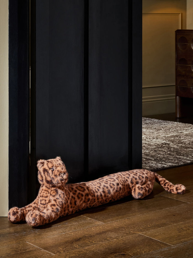 Faux fur leopard draught excluder, imported from the UK