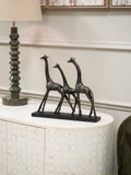 Libra Interiors bronze family of three giraffes sculpture, UK version