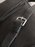 Black leather messenger bag with cross-body strap, UK version