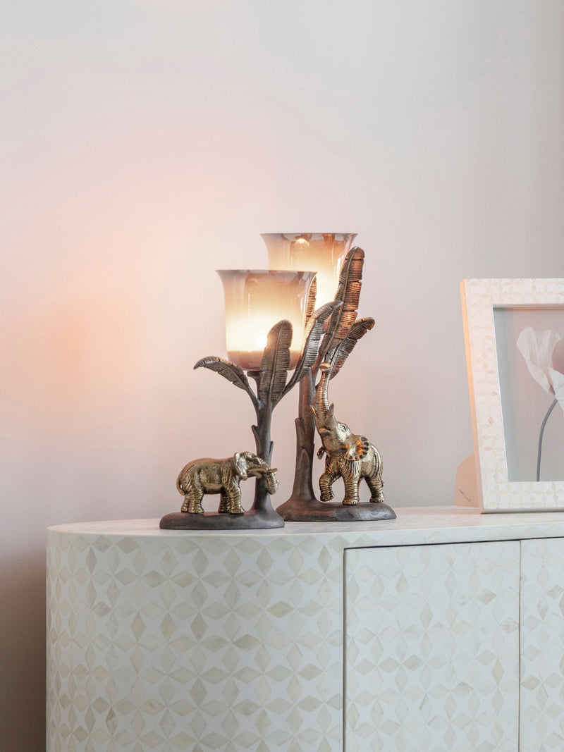 Libra Interiors Gold Kariba Elephant Hurricane 37cm candle holder, UK version