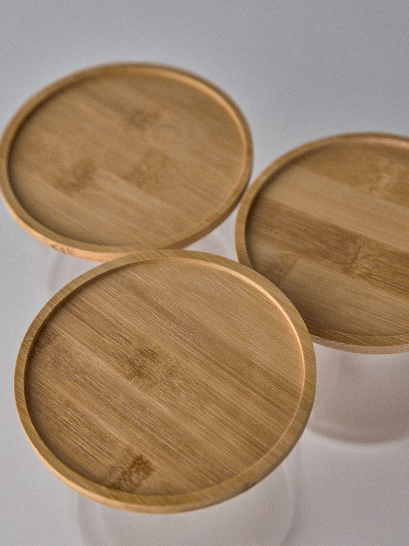 The Set clear glass stacking jars with wooden lids imported from UK