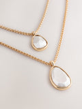 Gold tone two row drop necklace, UK version