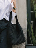NAGHEDI black medium hobo bag (British brand)