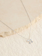 Next Silver Tone Sterling Bow Charm Necklace- Buy online at McGrocer