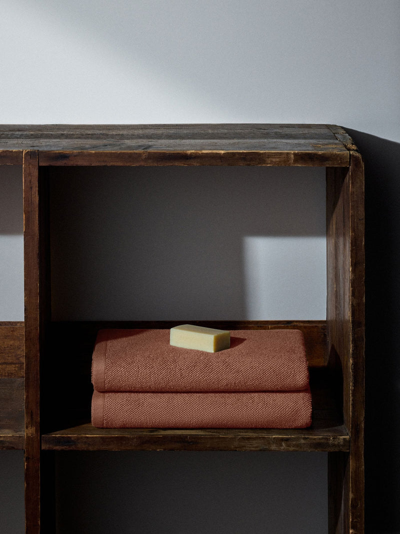 The Set rust popcorn textured 100% cotton bath towels, imported from the UK