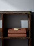 The Set rust popcorn textured 100% cotton bath towels, imported from the UK
