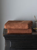 The Set rust popcorn textured 100% cotton bath towels, imported from the UK