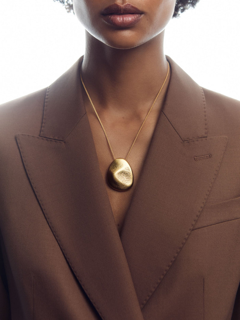 Reiss Perdita gold tone necklace with textured pebble pendant 51cm, imported from the UK