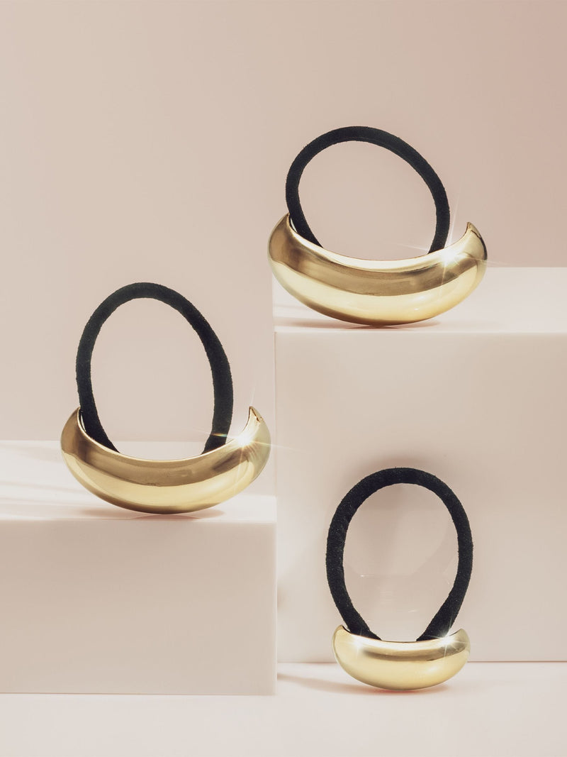Kitsch medium gold cloud ponytail cuff - British product