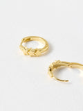 Oliver Bonas gold tone tiny triple star huggie earrings, imported from the UK