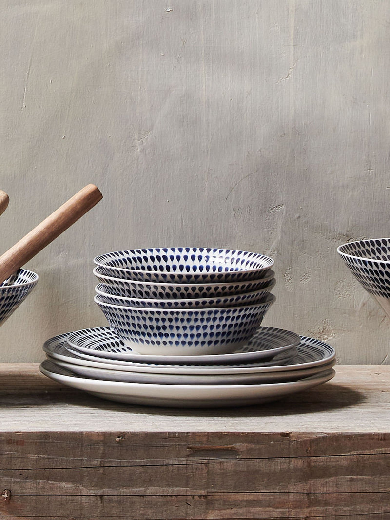 Nkuku Cream Indigo Drop ceramic dinnerware set 12-piece, imported from the UK
