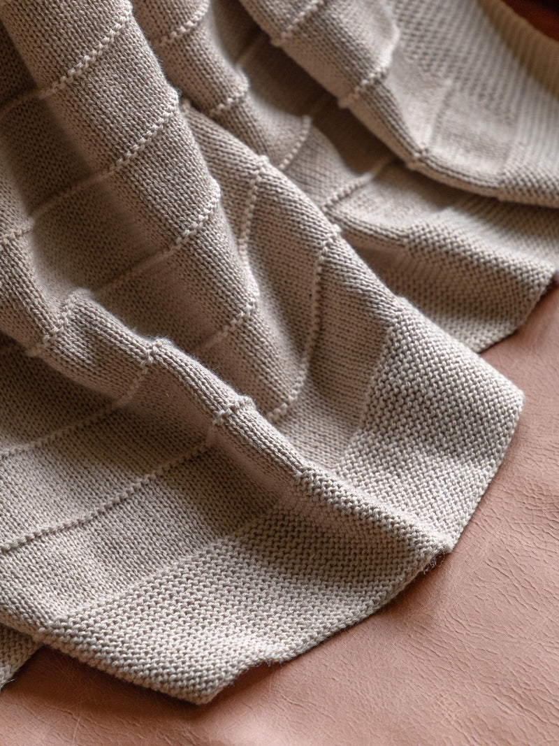 Gallery Home taupe knit throw, imported from the UK