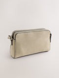 Stone double zip cross-body bag in faux suede, imported from the UK