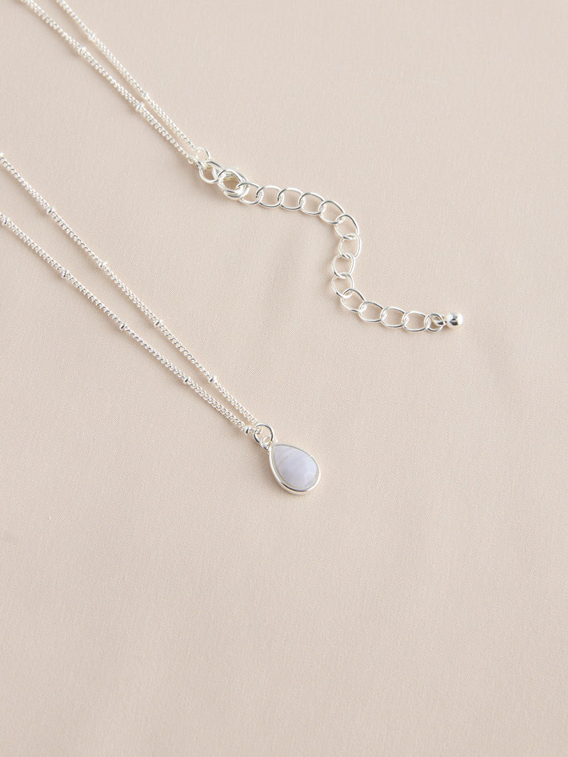 Gold tone semi-precious stone pendant necklace, UK version