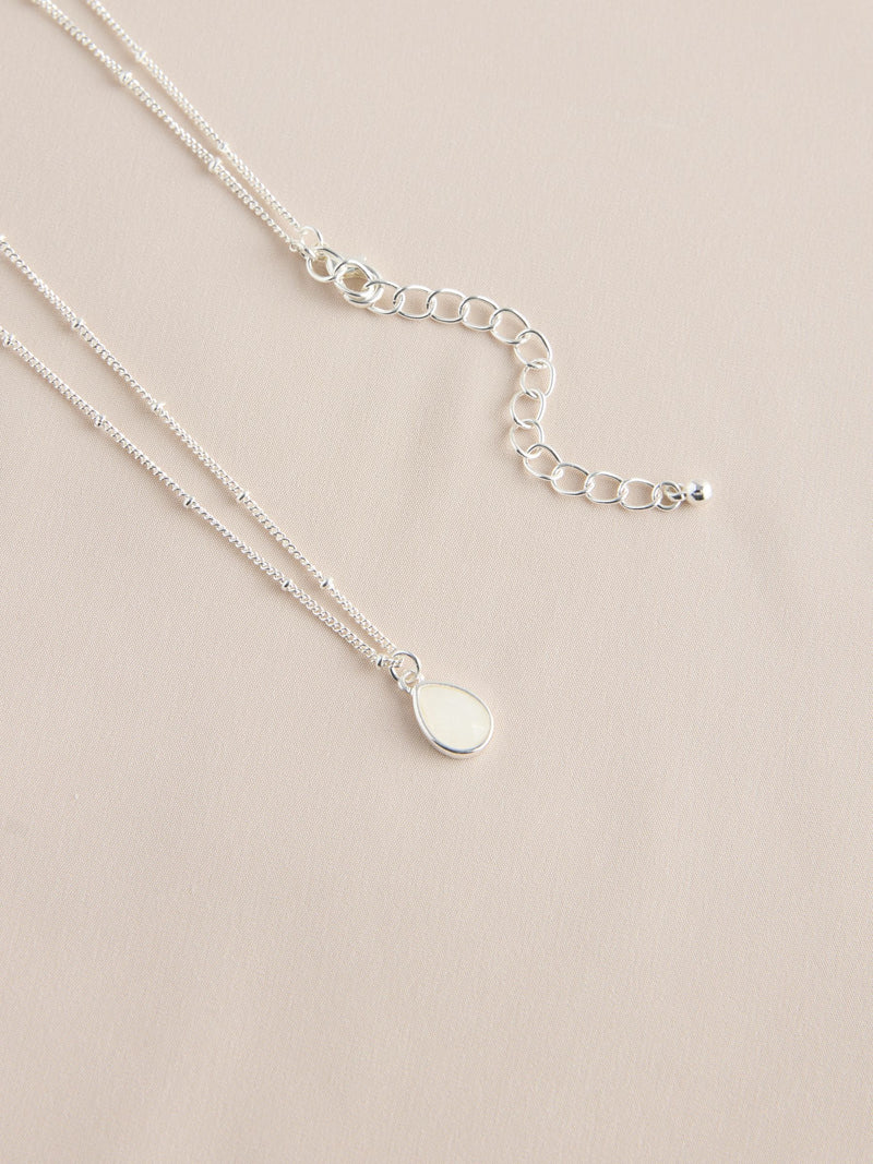 Gold tone semi-precious stone pendant necklace, UK version