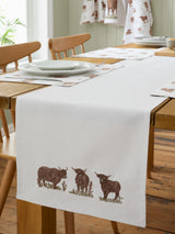 Next Catherine Lansfield Natural Angus Highland Cow Cotton Dining Table Runner 220cm x 33cm- Buy online at McGrocer