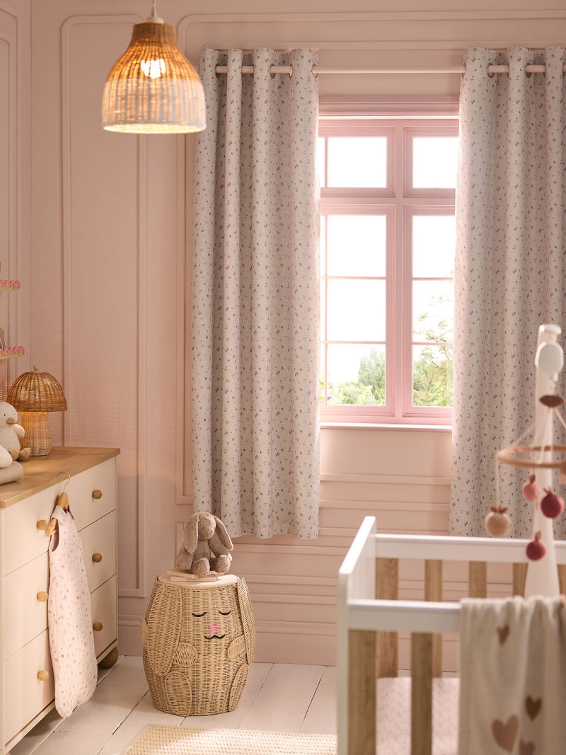 Pink ditsy eyelet blackout curtains, imported from the UK