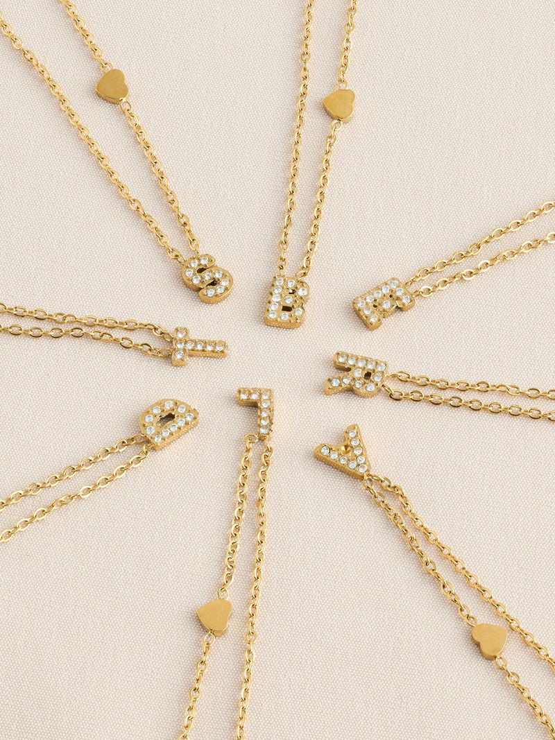 Gold tone stainless steel initial necklace, imported from the UK
