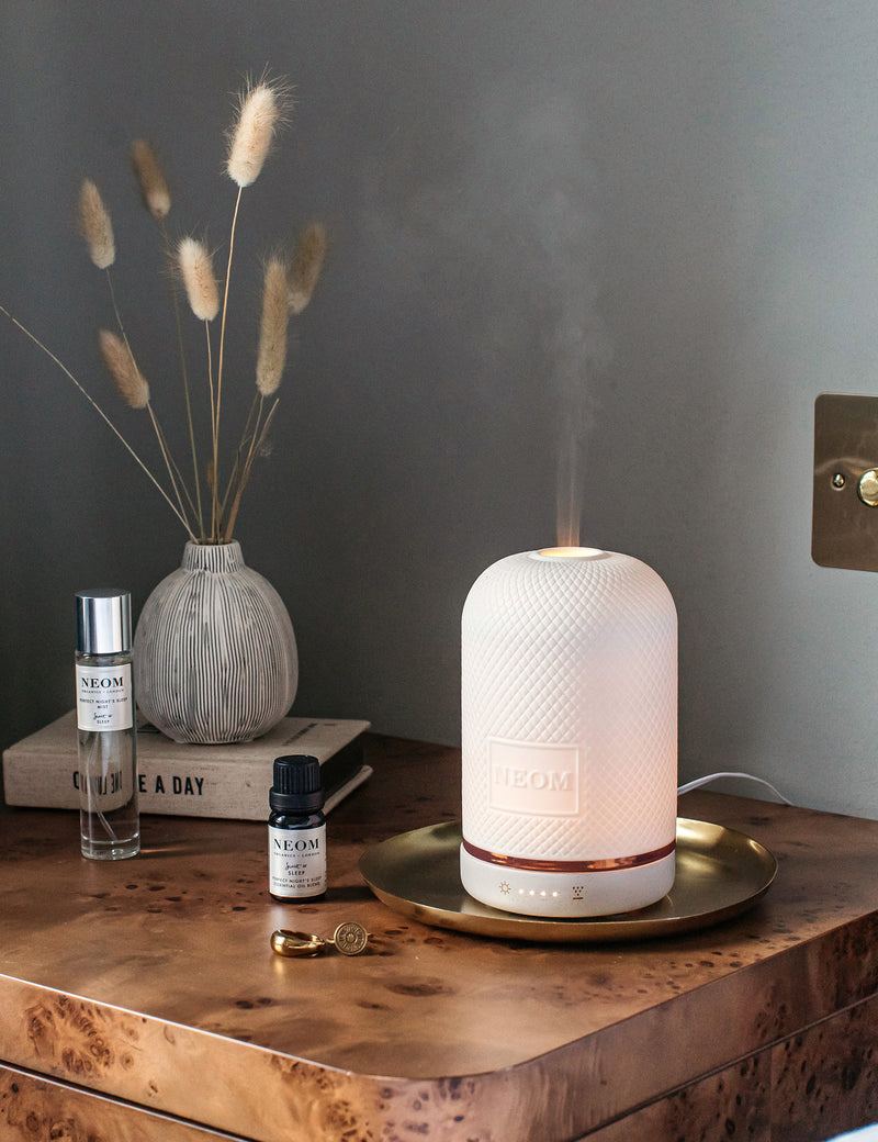 NEOM Wellbeing Pod aromatherapy diffuser with ceramic cover and wood base (British brand)