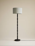 Bobbin floor lamp with wooden detailing and cylinder shade, imported from the UK