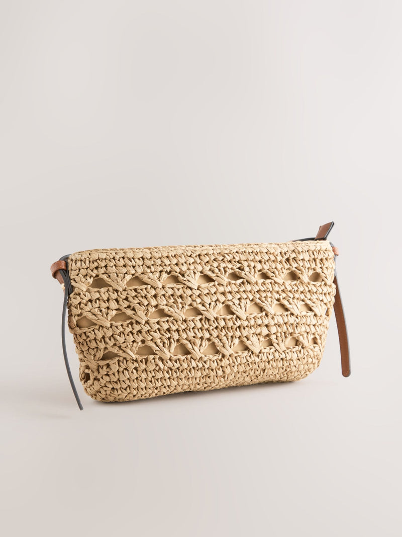 Natural raffia effect cross-body bag with recycled lining (British brand)