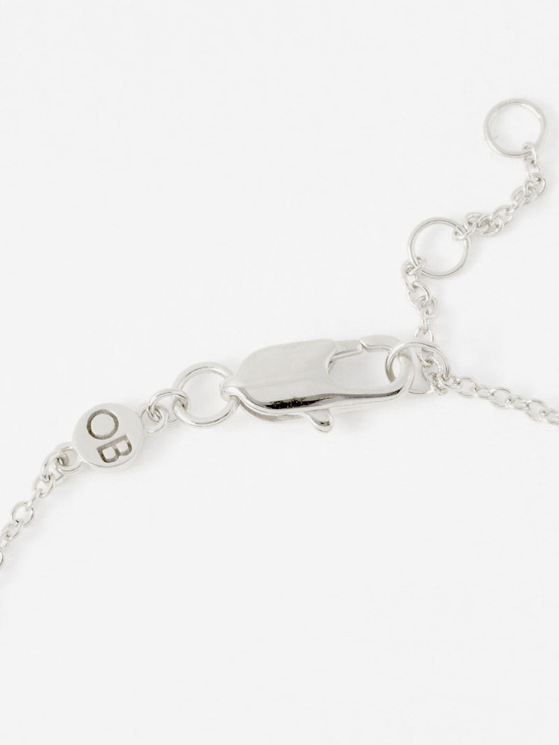 Oliver Bonas Milo Paw Print bracelet, imported from the UK