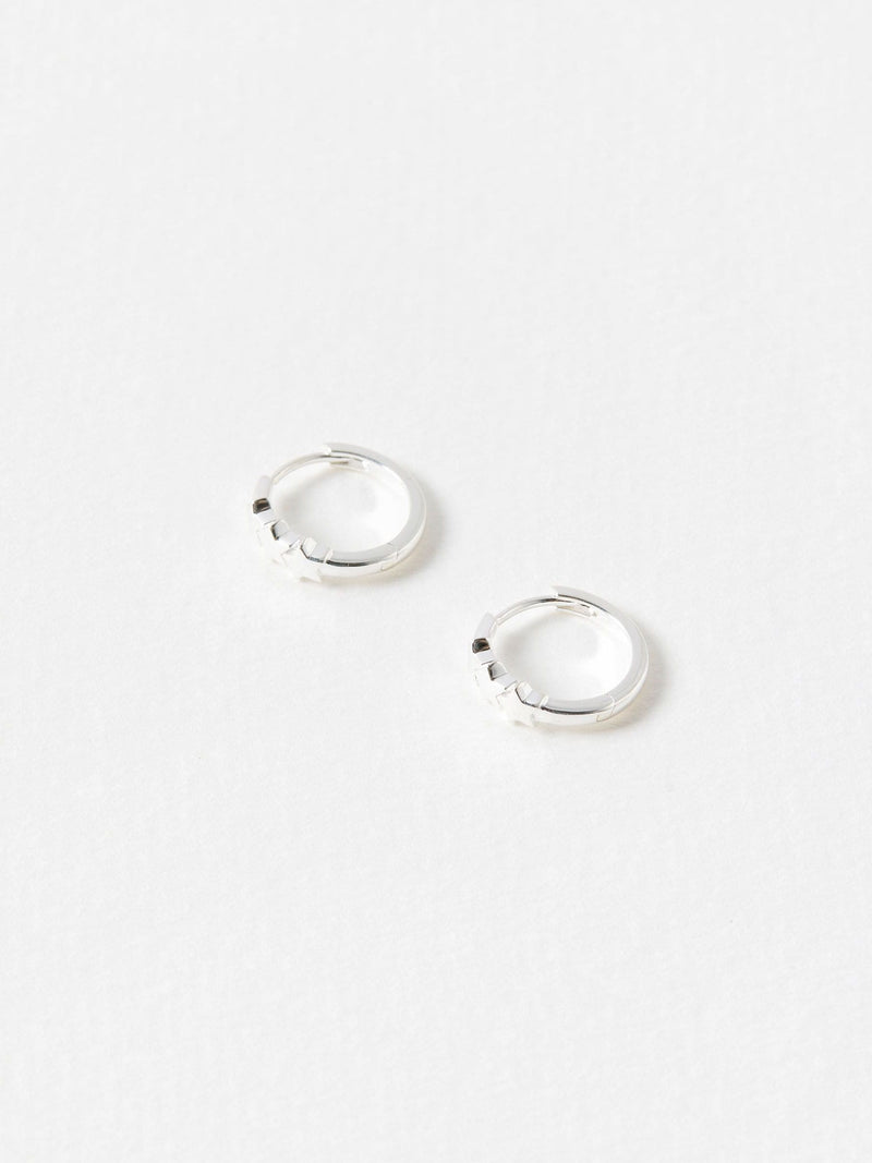 Oliver Bonas Tiny Triple Star Huggie Earrings, imported from the UK