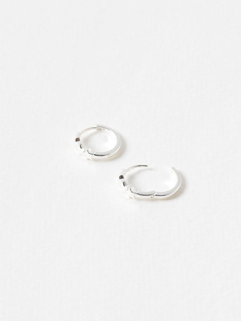 Oliver Bonas Tiny Triple Star Huggie Earrings, imported from the UK