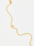 Oliver Bonas gold tone paw print charm bracelet, imported from the UK