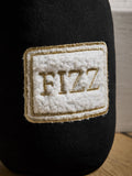 Black bottle of fizz doorstop, imported from the UK