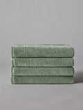 The Set sage green popcorn textured hand towels 4 pack, UK version
