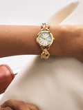 Gold-tone watch with taupe weave PU strap - UK version
