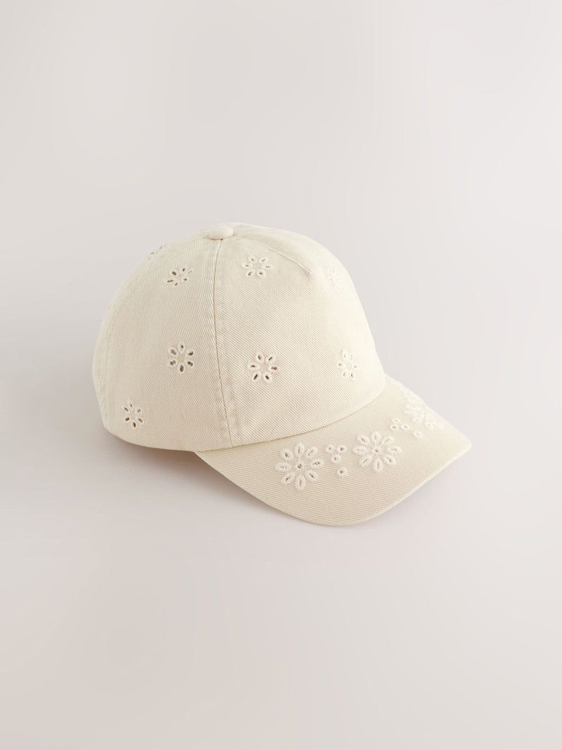 Children's cream baseball cap with laser-cut embroidery (British brand)