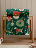 Duvet Day festive fleece throw with Christmas treats print, UK version