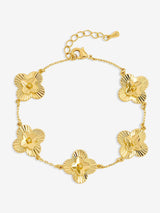 Inicio Gold Tone Diamond Cut Clover Station Bracelet